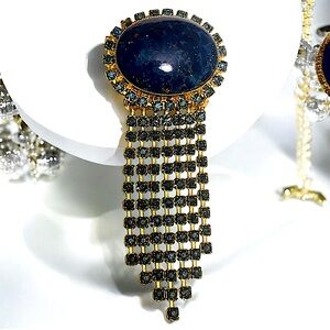 50s Art Deco style, Cabochon Lapis brooch surrounded by triangular lapis accents